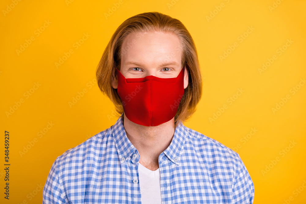 Close up photo of carefree cheerful nice cute freelancer stay home covid-19 quarantine wearing checkered shirt medical mask isolated over vivid color background