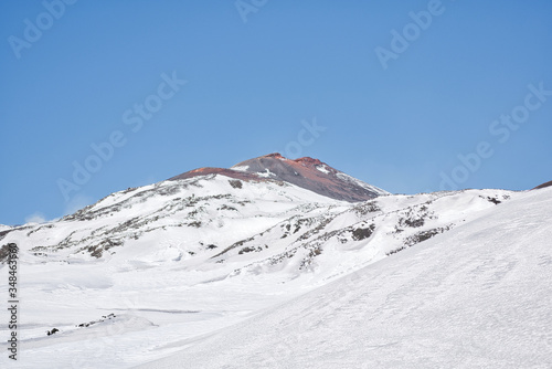 Snowy volcano with smoke in sicily © beau