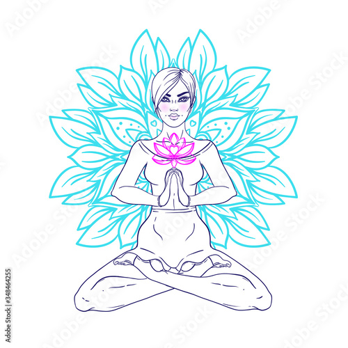 Chakra concept. Girl sitting in lotus position over colorful ornate mandala. ...