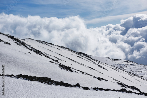 Snowy side of a volcano mountain in Sicily