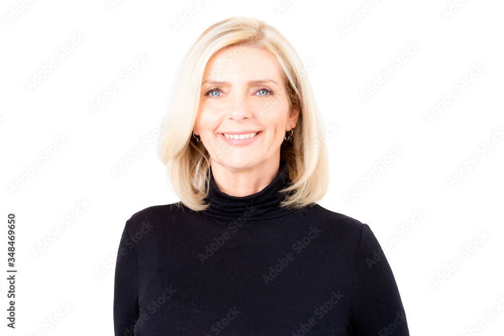 Attractive blond woman looking at camera and smiling while standing at isolated white background Attractive blond woman looking at camera and smiling while standing at isolated white background