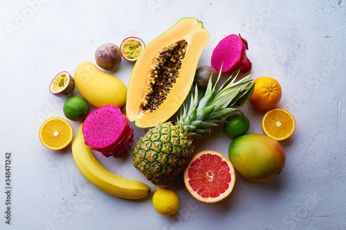 Flat lay with variety of fresh tropical fruits