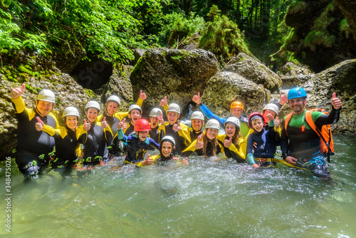 Riesen-Gaudi in der Gruppe beim Abenteuersport Canyoning photo