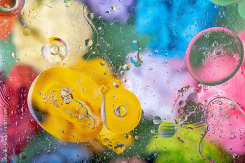 Abstract colorful background. Oil and water drops. Rainbow blurred texture