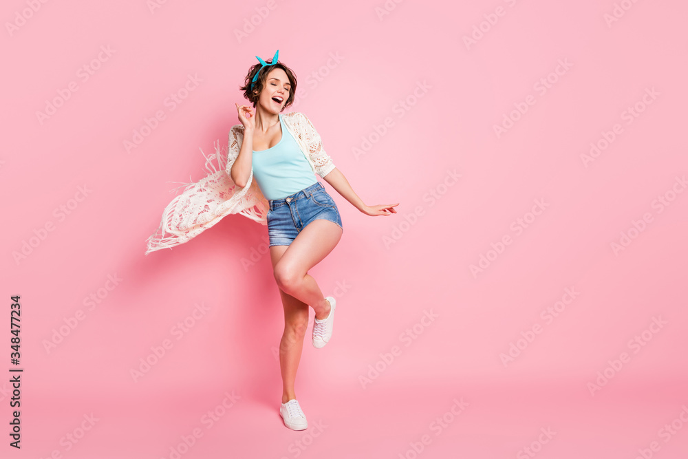 Full length body size view of her she nice attractive lovely pretty charming slender cheerful cheery glad girl dancing disco having fun air wind blowing isolated over pink pastel color background Full length body size view of her she nice attractive lovely pretty charming slender cheerful cheery glad girl dancing disco having fun air wind blowing isolated over pink pastel color background