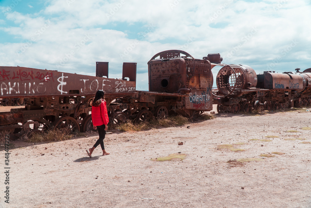 Tourist, Train Cemetry Bolivia Salt Flats. Bolivian salty desert and ...