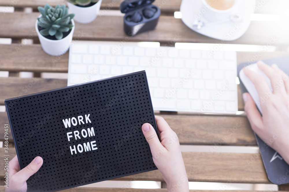 Work from home concept due to quarantine with computer keyboard and coffee cup Work from home concept due to quarantine with computer keyboard and coffee cup