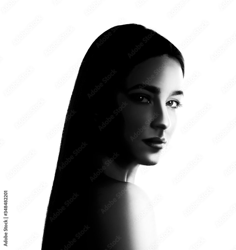 High contrast black and white portrait of beautiful young woman High contrast black and white portrait of beautiful young woman
