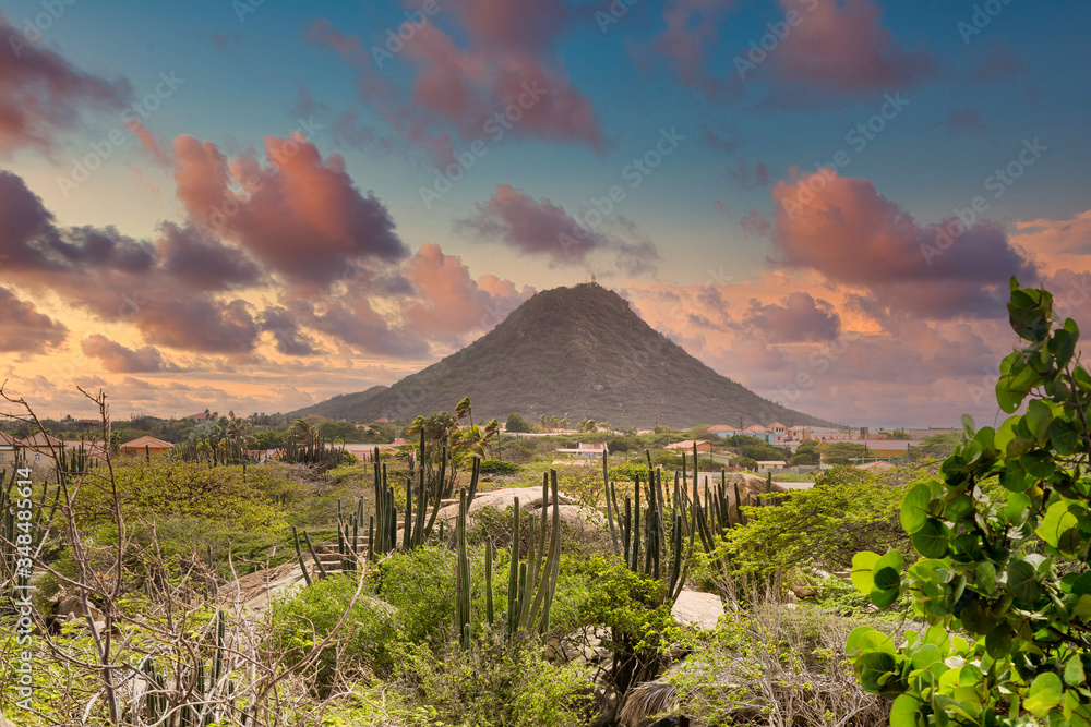 Ταπετσαρία Aurba's only mountain rising from the desert terrain