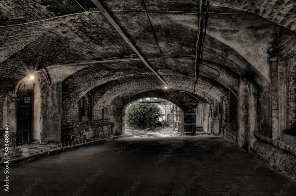 Beautiful abandoned arch in the old scary city