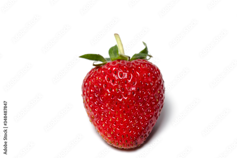 Strawberries are arranged in different styles on a white background. Strawberries are arranged in different styles on a white background.