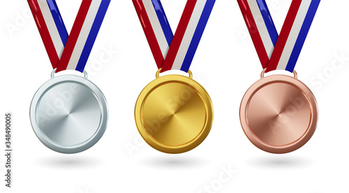 Vector gold medal with ribbon, set of isolated awards in realistic design. Symbol of victory and sporting achievements. Celebration and ceremony concept.
