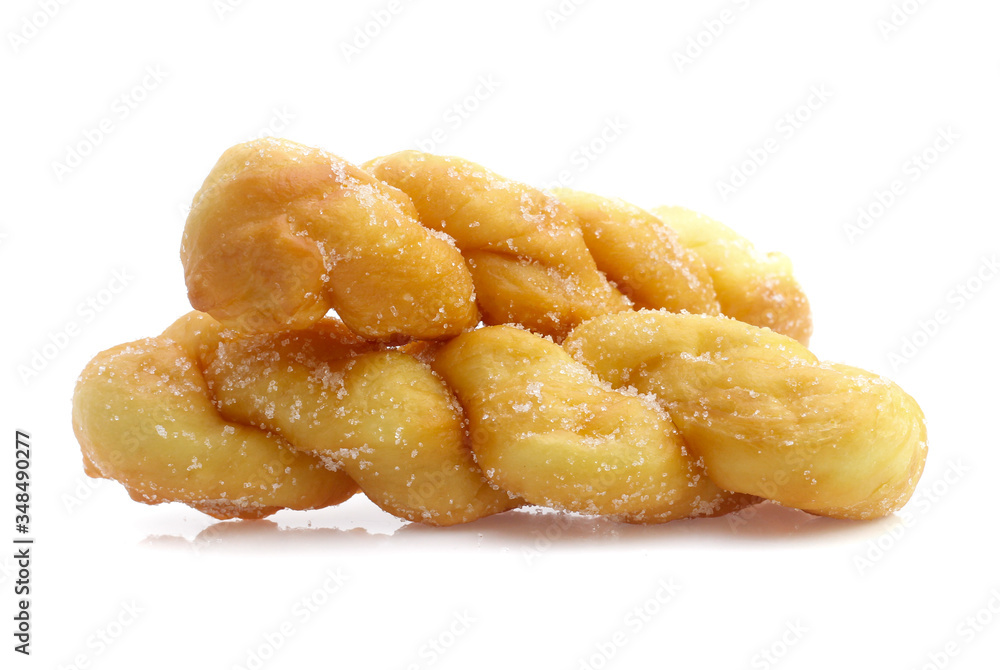 twisted bread donuts with sugar isolated on white twisted bread donuts with sugar isolated on white