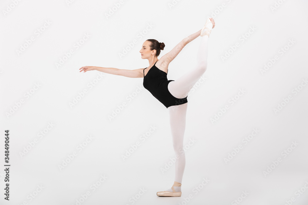 Image of caucasian woman ballerina practicing and dancing gracefully