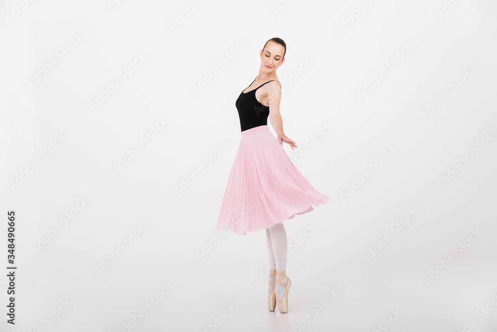 Image of caucasian woman ballerina practicing and dancing gracefully Image of caucasian woman ballerina practicing and dancing gracefully