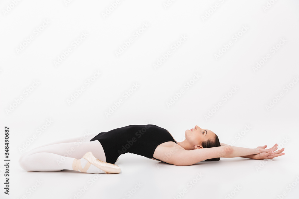 Image of caucasian woman ballerina practicing and stretching her body Image of caucasian woman ballerina practicing and stretching her body
