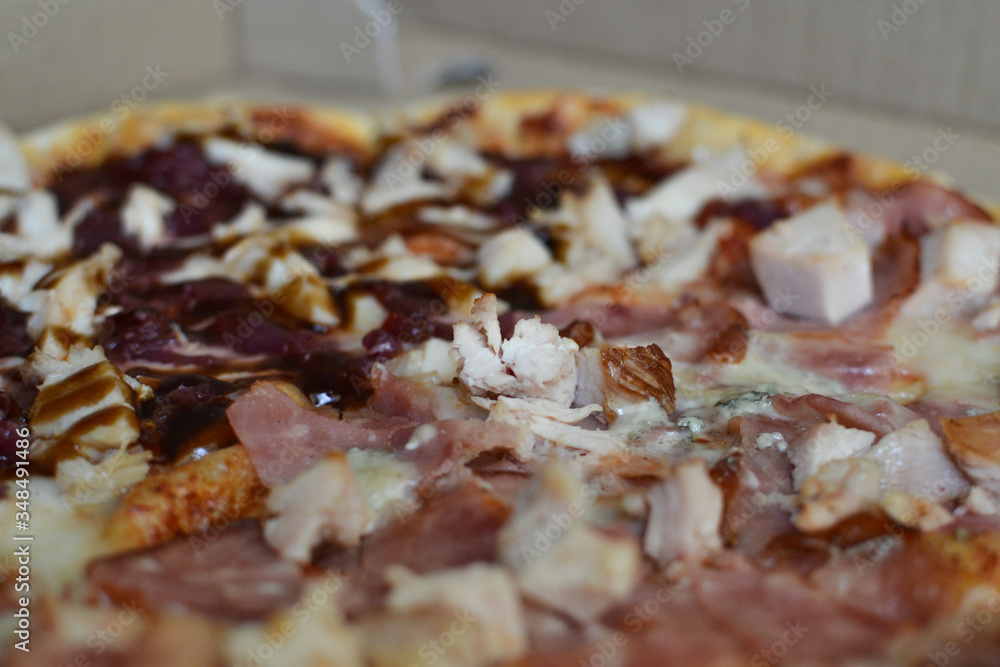 Ingredients in ready-made pizza close-up after cooking. Ingredients in ready-made pizza close-up after cooking.