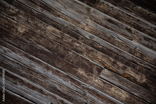 wooden brown planks with shiny surface, texture.