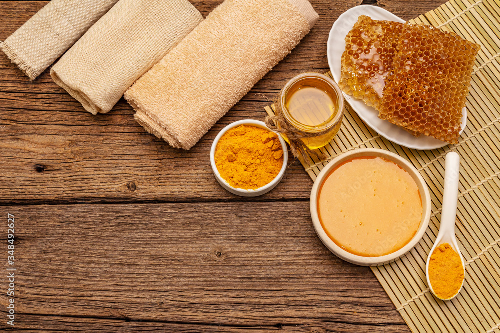 Spa concept. Self care with honey and turmeric. Natural organic cosmetics, homemade product, alternative lifestyle. Vintage background Spa concept. Self care with honey and turmeric. Natural organic cosmetics, homemade product, alternative lifestyle. Vintage background