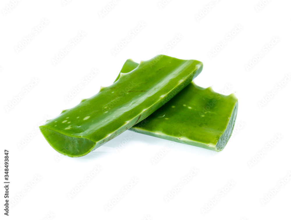 Fresh aloe vera leaves with water drops isolated on white Fresh aloe vera leaves with water drops isolated on white