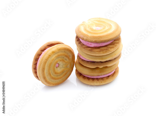 sandwich cookies with strawberry cream on white background