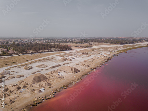 pink lake retba in the suburbs of Dakar photographed from a drone in Africa salt mining photo