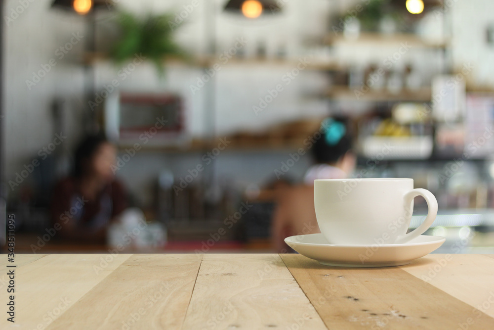 Hot Coffee cup on the wooden table Hot Coffee cup on the wooden table