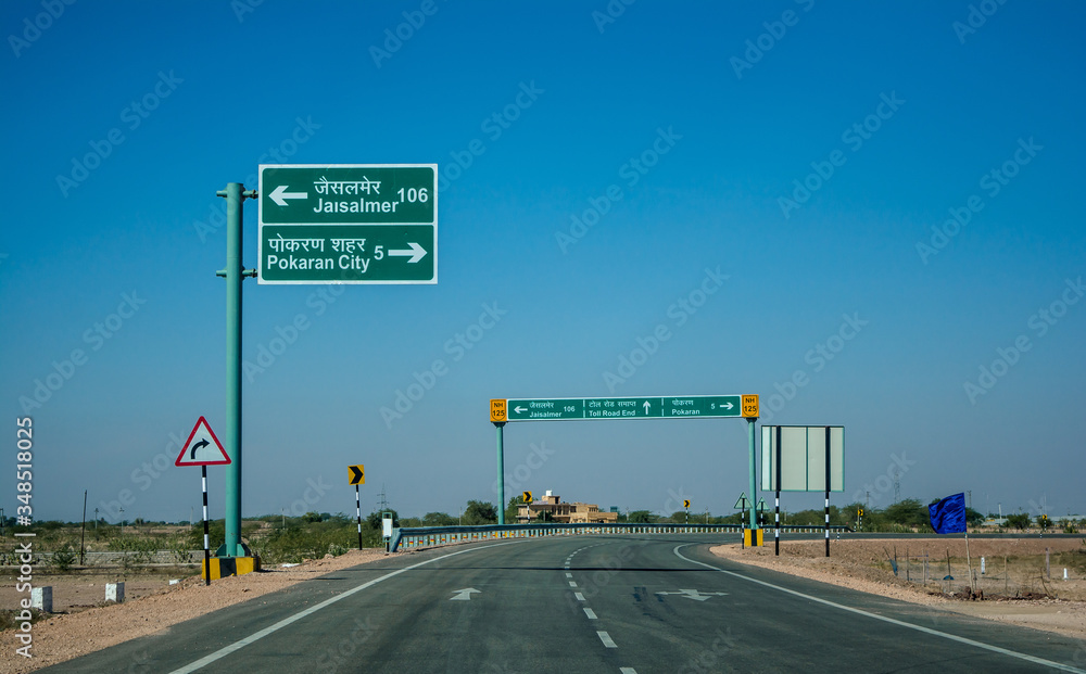 Highway, path, road in Desert of Rajasthan, India.
Road passing through a landscape, Jodhpur, Rajasthan, India