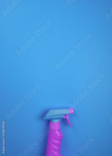 Commercial cleaning company. General or regular cleanup background .chemical spray bottle. on colorful background. minimalism 
