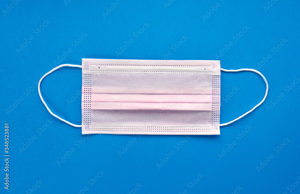 coronavirus COVID-19 pandemic. antiviral medical mask for protection against corona virus. Surgical protective mask. Medical respiratory bandage face on white background. quarantine, stay at home coronavirus COVID-19 pandemic. antiviral medical mask for protection against corona virus. Surgical protective mask. Medical respiratory bandage face on white background. quarantine, stay at home