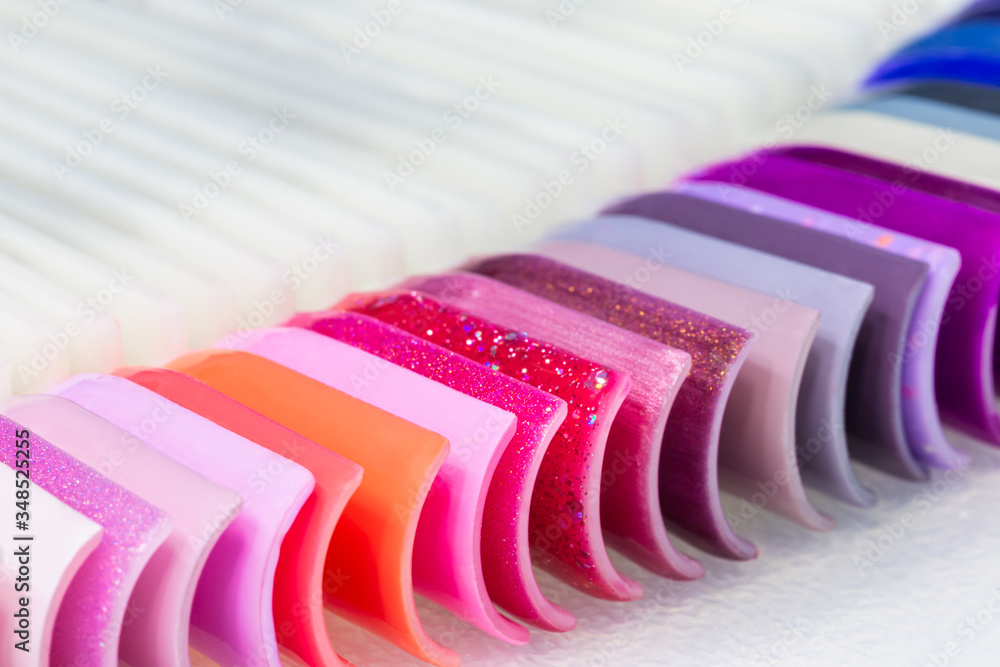 Samolepka Background of various colorful palette of nail Polish for manicure