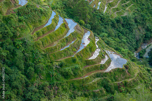 Overview of the Banaue rice terrace at hungduan rice terraces - ifugao with a look in the valley