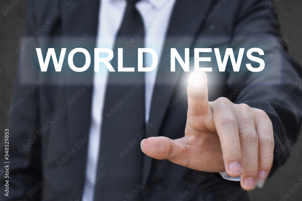 Businessman hand pressing news world button. Idea for business, technology and internet. Businessman hand pressing news world button. Idea for business, technology and internet.