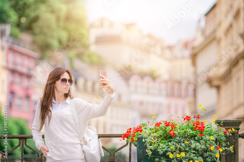 Caucasian tourist walking along the deserted streets of Europe.