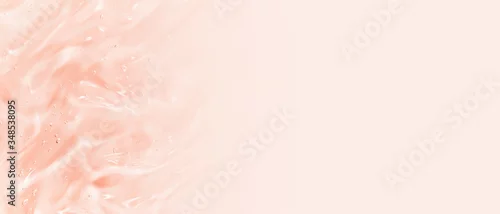 Obraz Beauty serum background. Clear liquid gel splash. Transparent pink color cosmetic cream texture. Skincare product banner