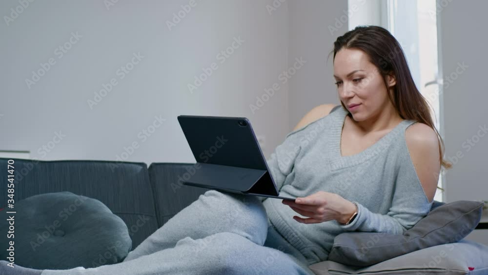 Woman with tablet pc at home Woman with tablet pc at home