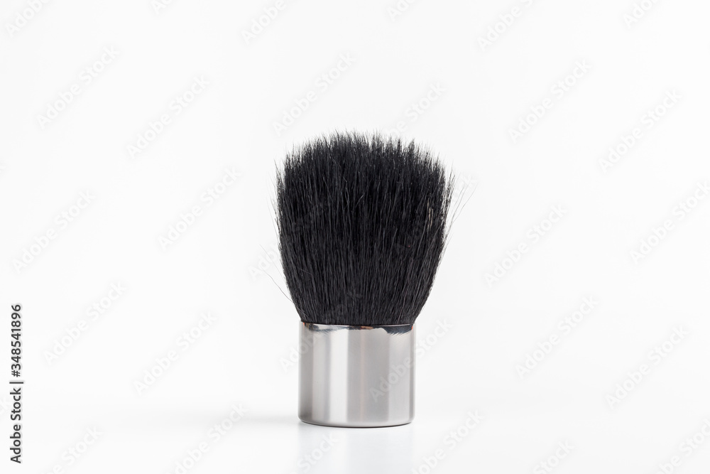 Makeup brush on a white background