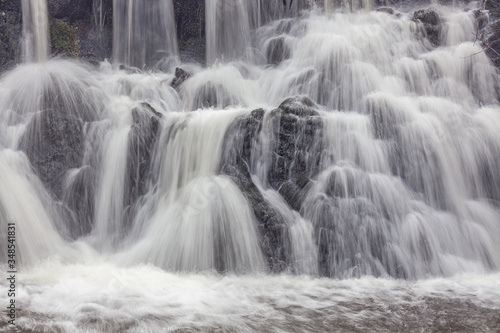 A waterfall in a forest in central Sweden photographed by a long exposure.