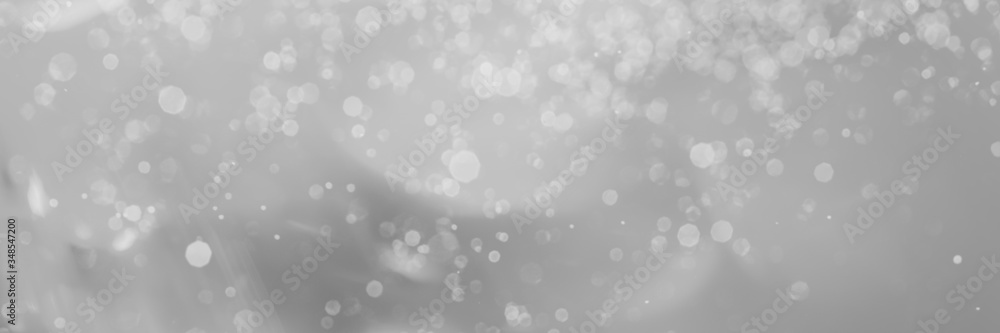 abstract gray background with bokeh lights and sunlight, panoramic background abstract gray background with bokeh lights and sunlight, panoramic background