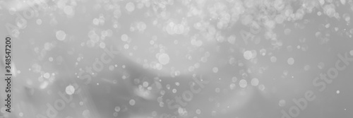 abstract gray background with bokeh lights and sunlight, panoramic background