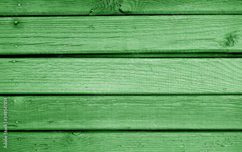 Wooden planks background in green color.