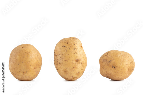 Young potato isolated on white background.
