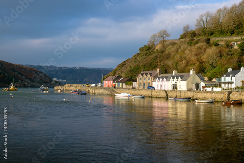 The lower town of Fishguard with houses at the seaside, Wales