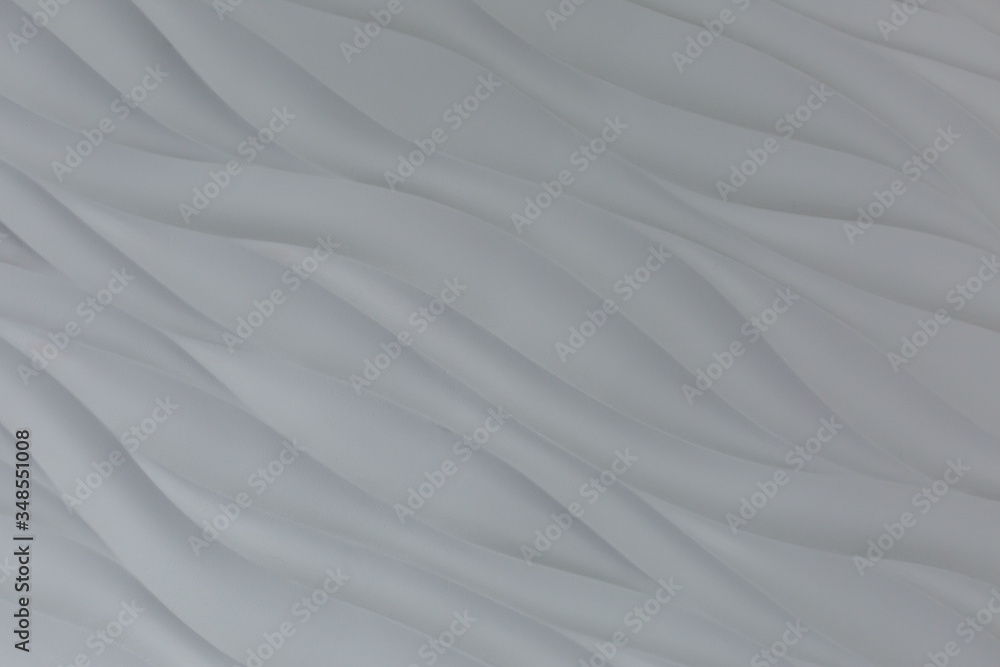 the background wall. background texture. wall with textured waves. the wave on the wall. white wall the background wall. background texture. wall with textured waves. the wave on the wall. white wall