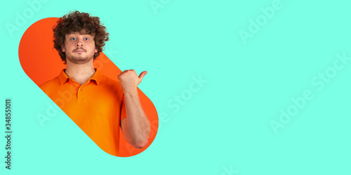 Εκτύπωση καμβά Portrait of young man on bright bicolor background