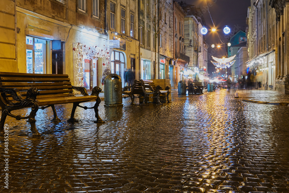 Fototapeta Night view of the old European town after rain. Lviv Ukraine