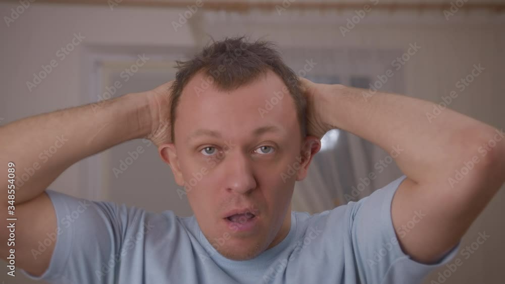 Portrait of a depressed man on knows what to do, stress Portrait of a depressed man on knows what to do, stress