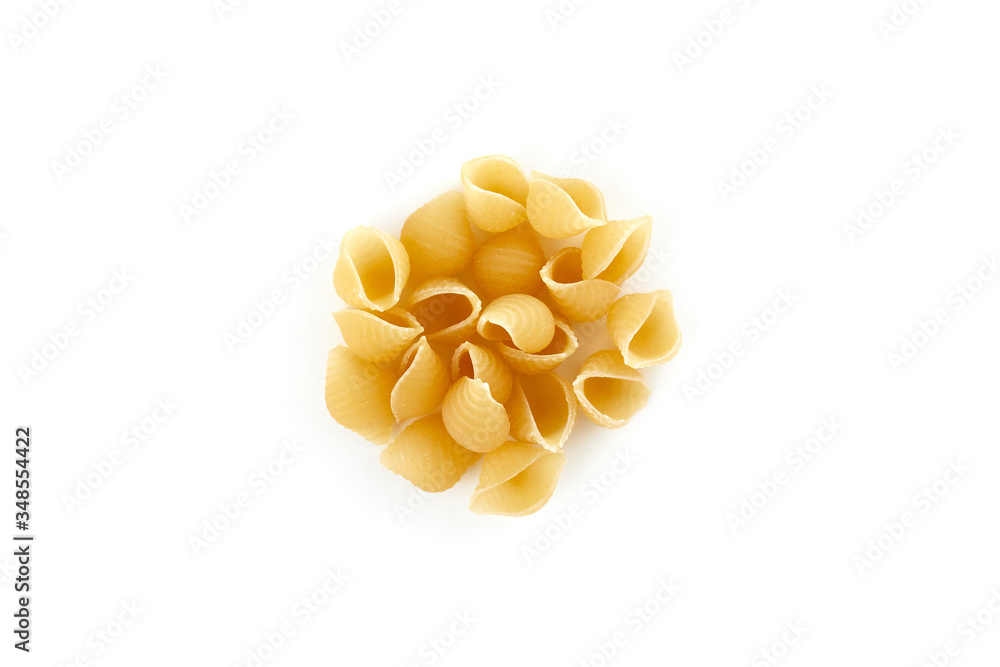 Italian raw dry pasta conchiglie rigate isolated on white background. top view Italian raw dry pasta conchiglie rigate isolated on white background. top view