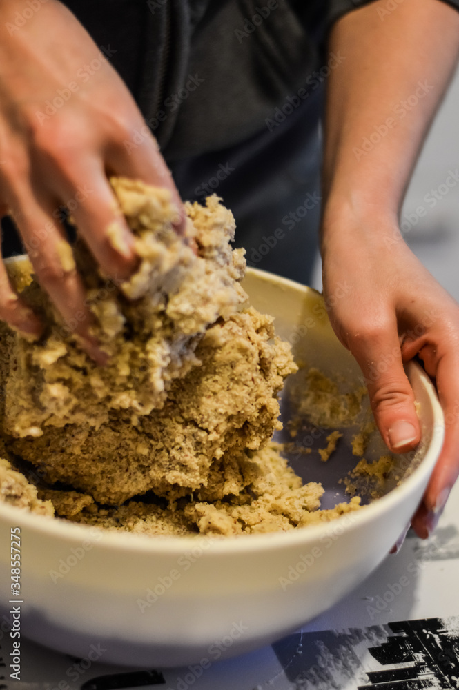 mixing ingredients to make cookies dough close up mixing ingredients to make cookies dough close up