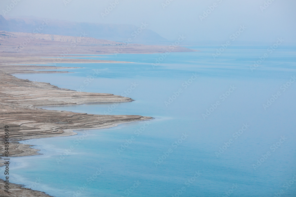 Obraz premium landscape of the Dead Sea, failures of the soil, illustrating an environmental catastrophe on the Dead Sea, Israel